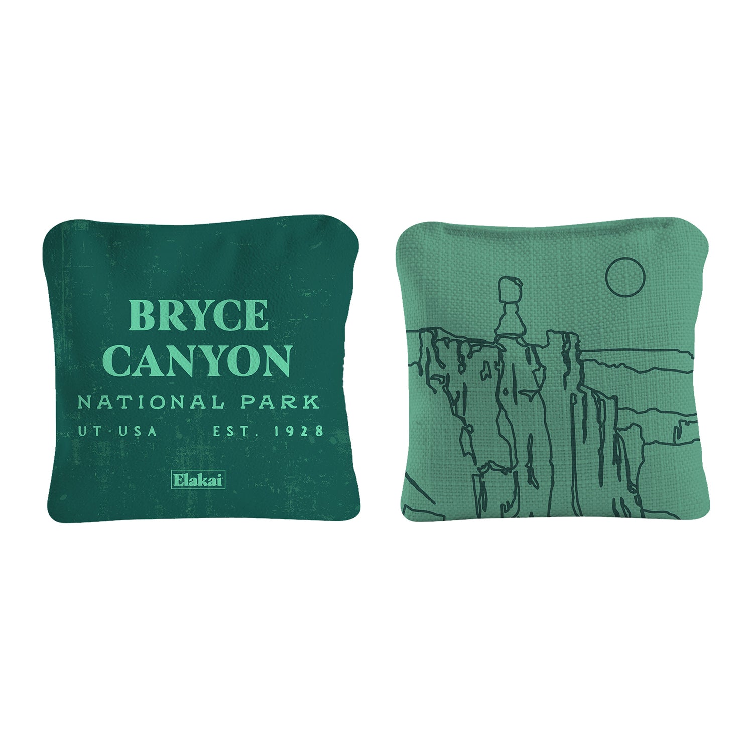 Two green pillows with Bryce Canyon National Park text and illustration on a white background