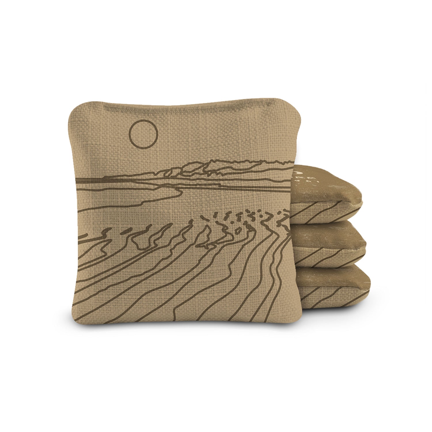 Set of three beige coasters with a landscape design on a white background
