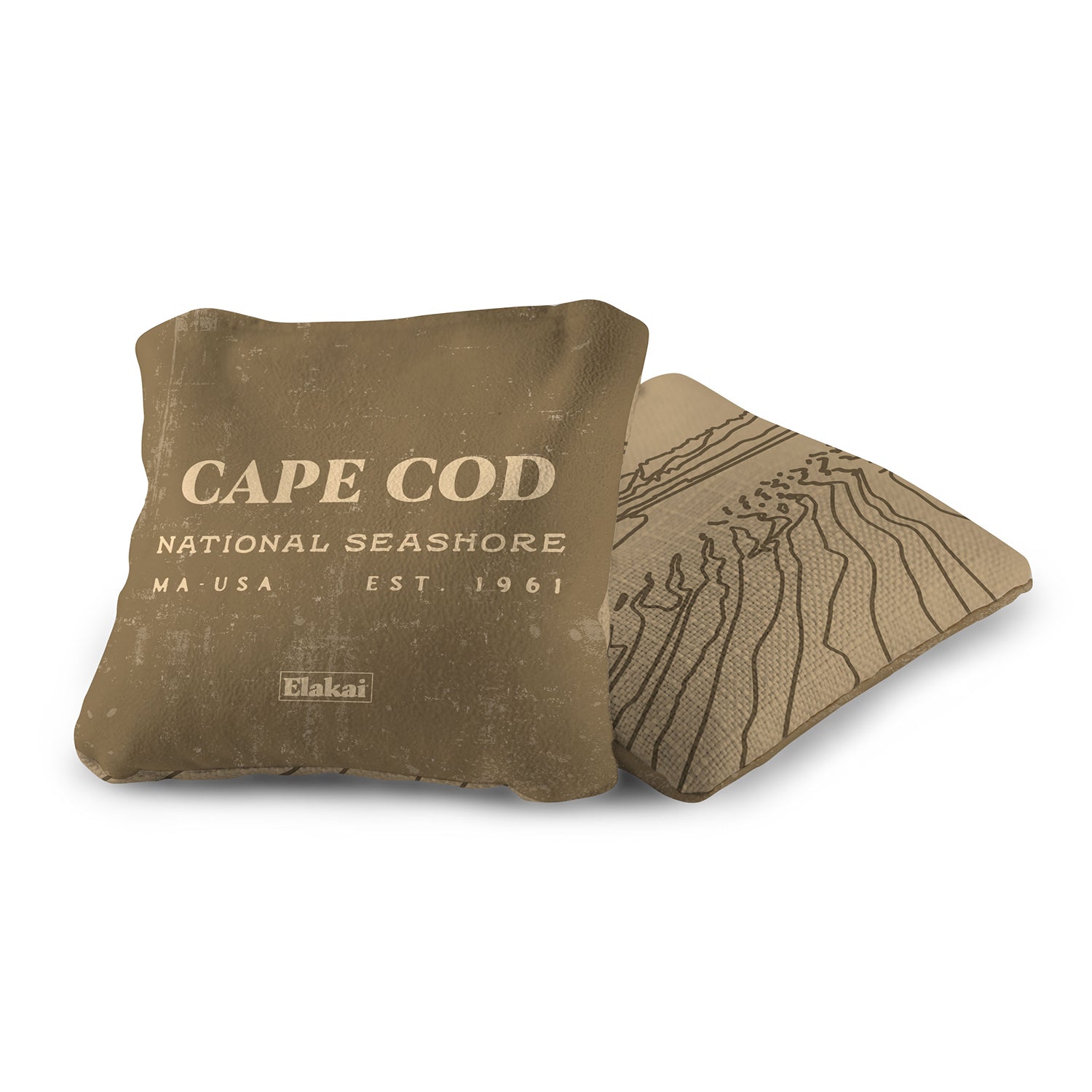 Brown pillow with 'Cape Cod National Seashore' text on a white background