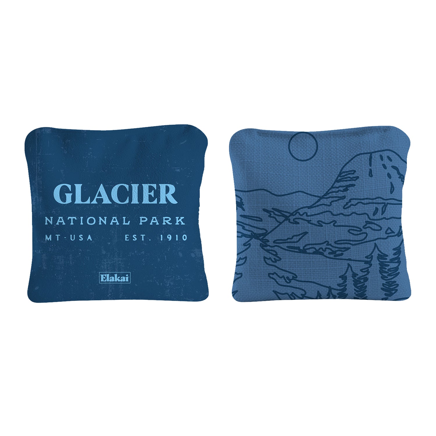 Two blue pillows with 'Glacier National Park' text and nature design on a white background