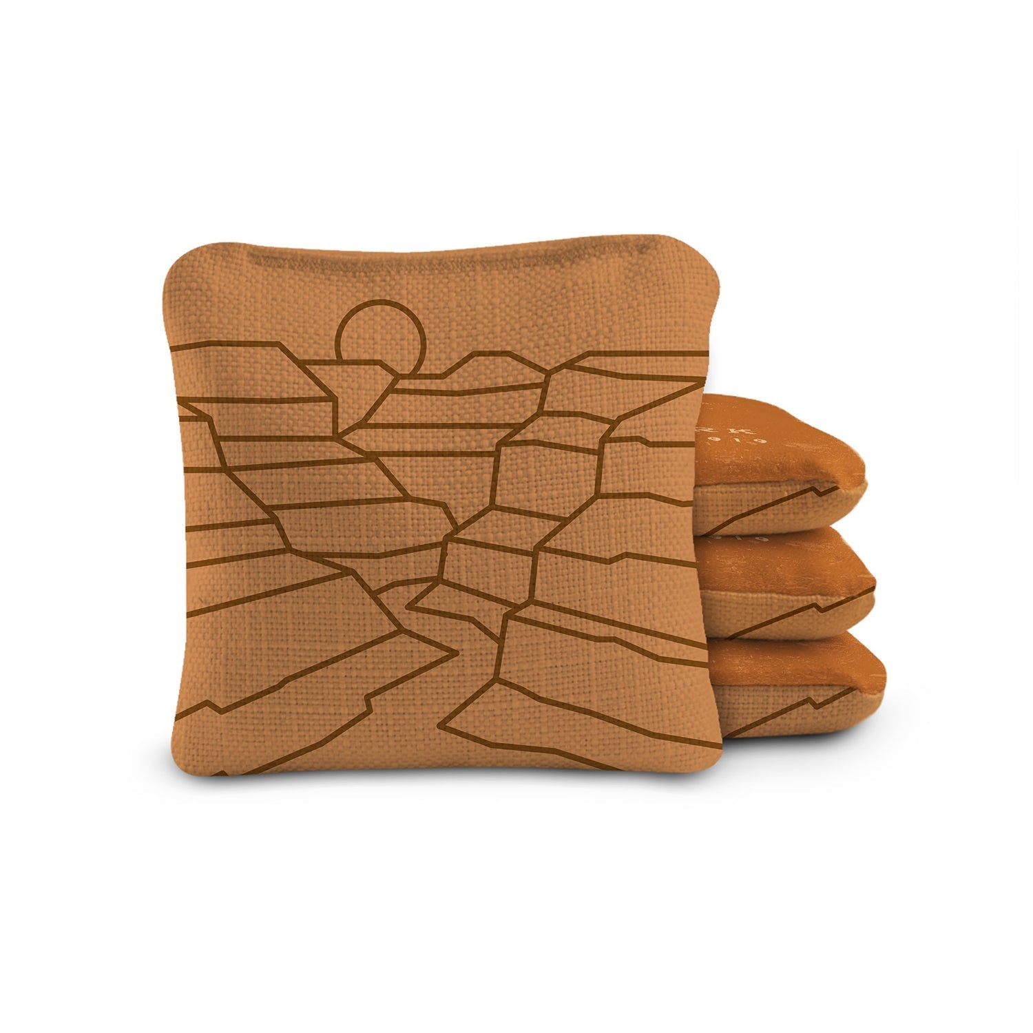 Stack of folded brown towels with a landscape design on a white background
