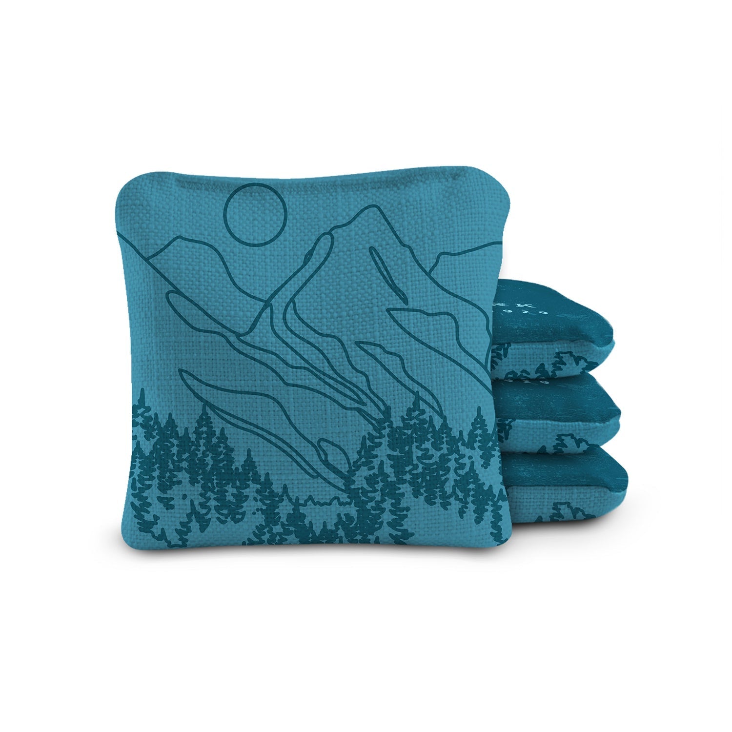 Teal bean bag with mountain and tree design on a white background