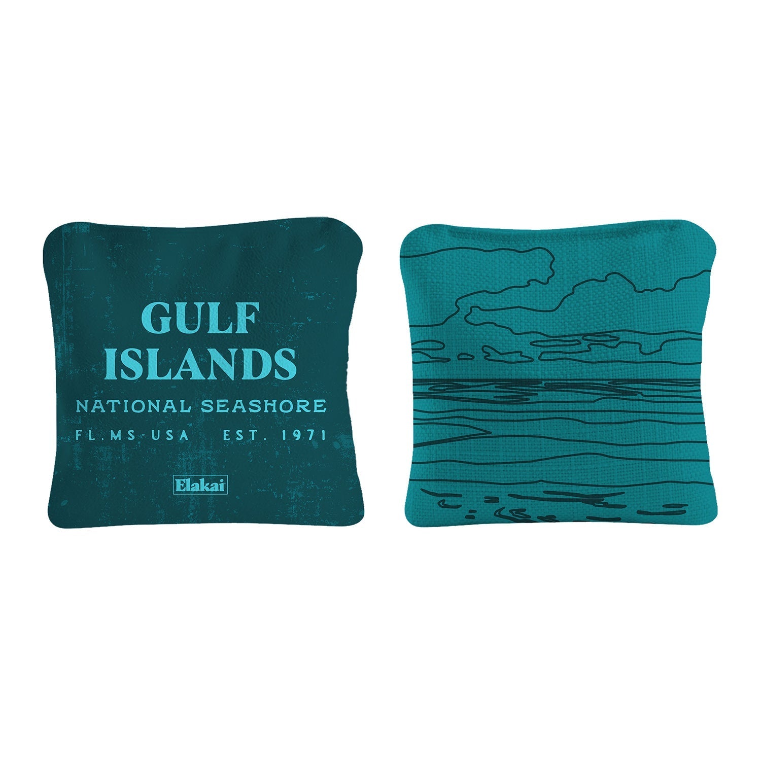 Two teal pillows with 'Gulf Islands National Seashore' text and wave design on a white background.