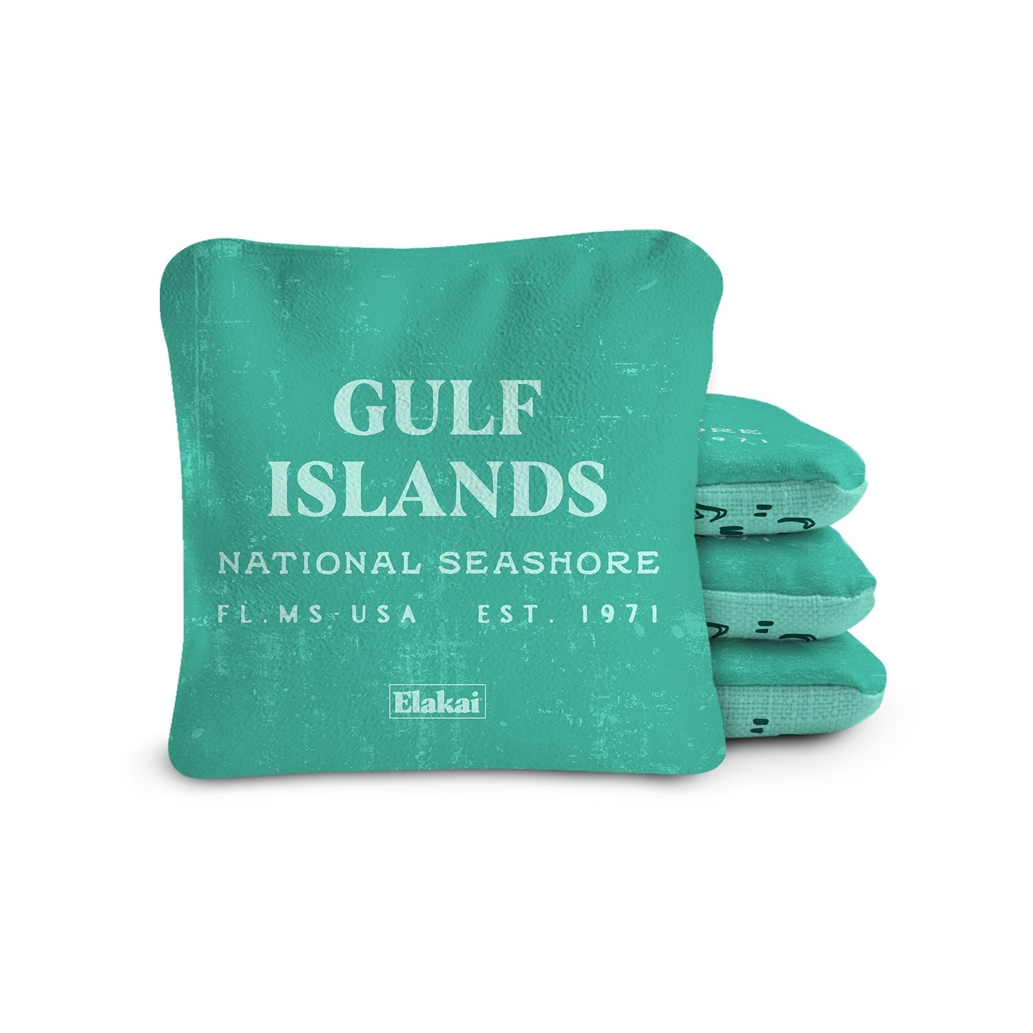 Green pillow with 'Gulf Islands National Seashore' text on a white background