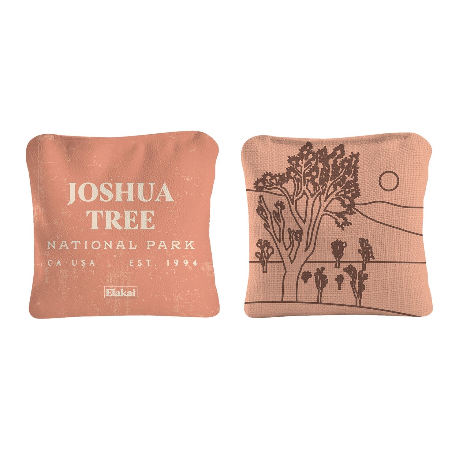 Two decorative pillows with 'Joshua Tree National Park' text and tree design on a white background.