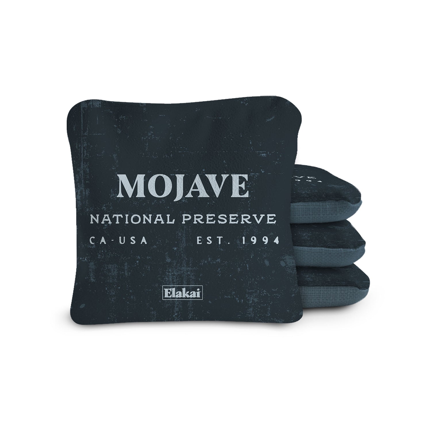 Blue fabric bags with Elakai branding on a white background