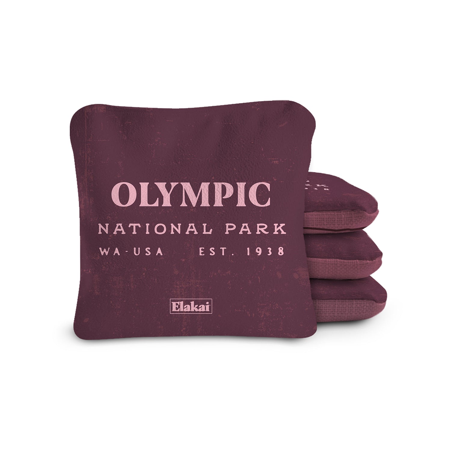 Blue fabric bags with Elakai branding on a white background