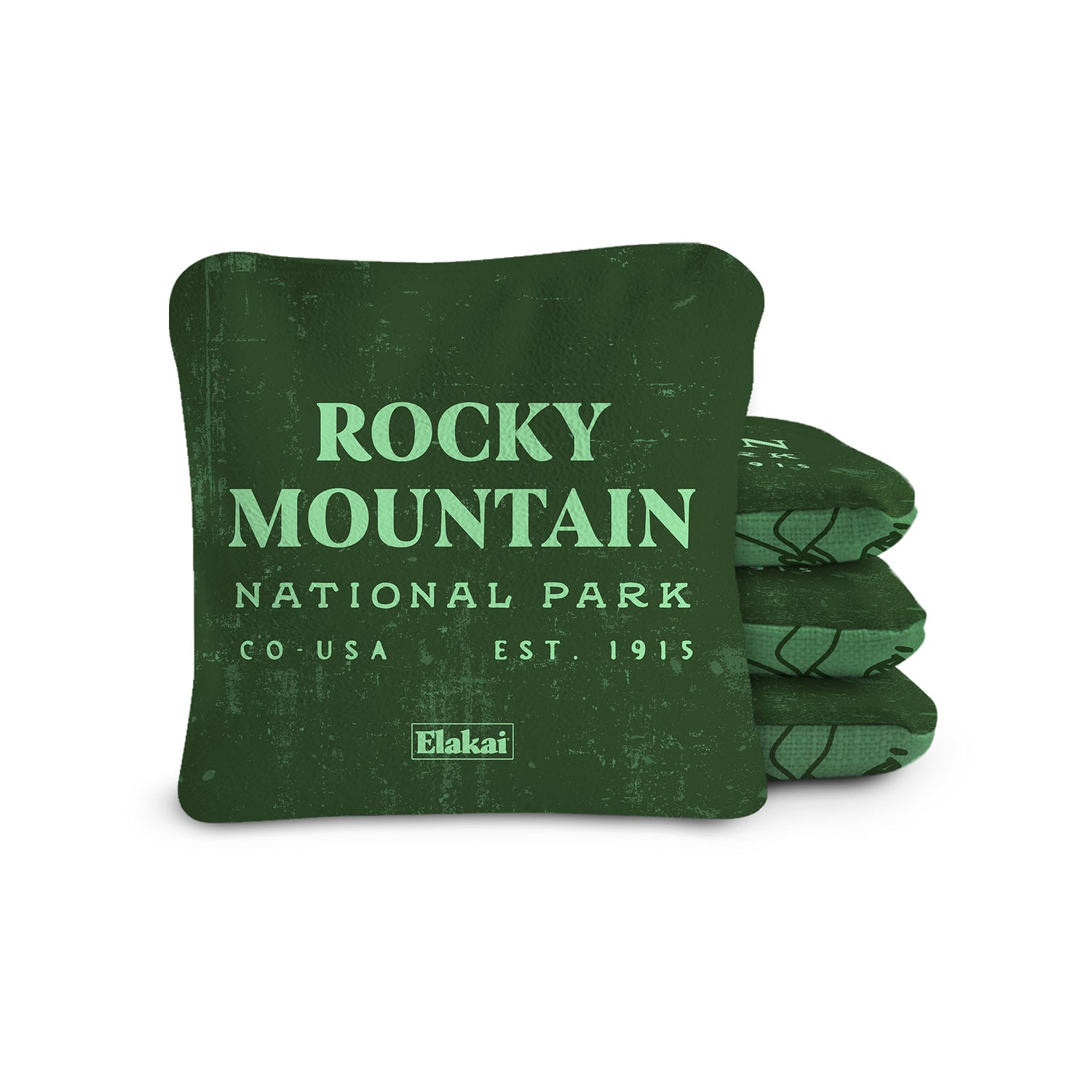 Blue fabric bags with Elakai branding on a white background