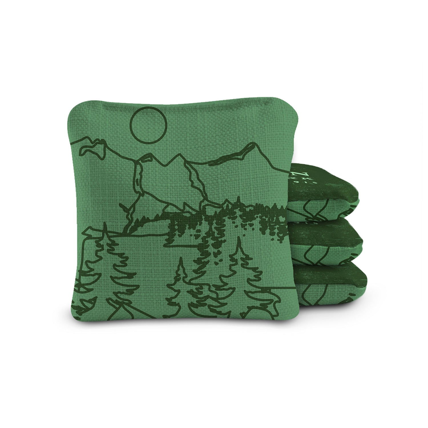 Green cornhole bags with mountain design on a white background