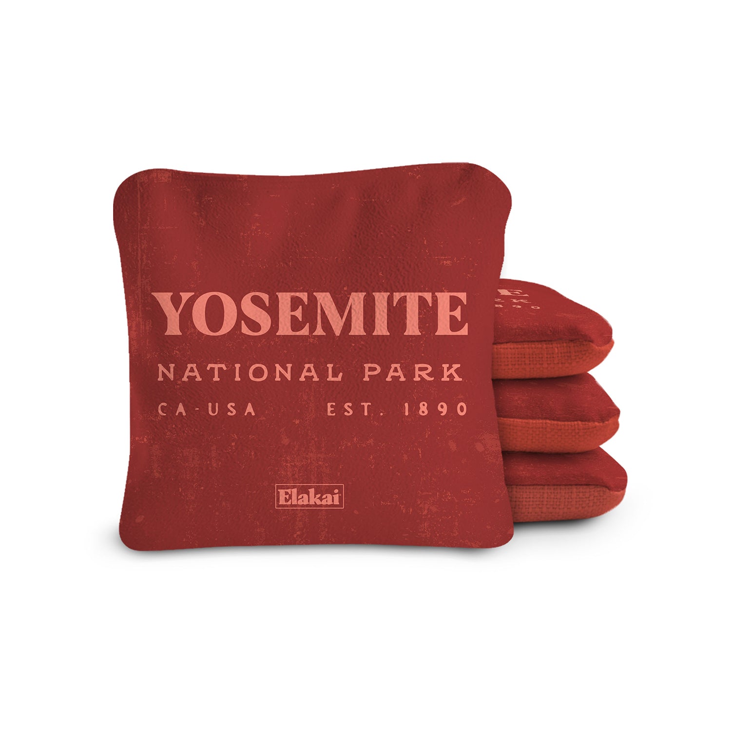 Folded blanket with 'Redwood National Park' text on a white background