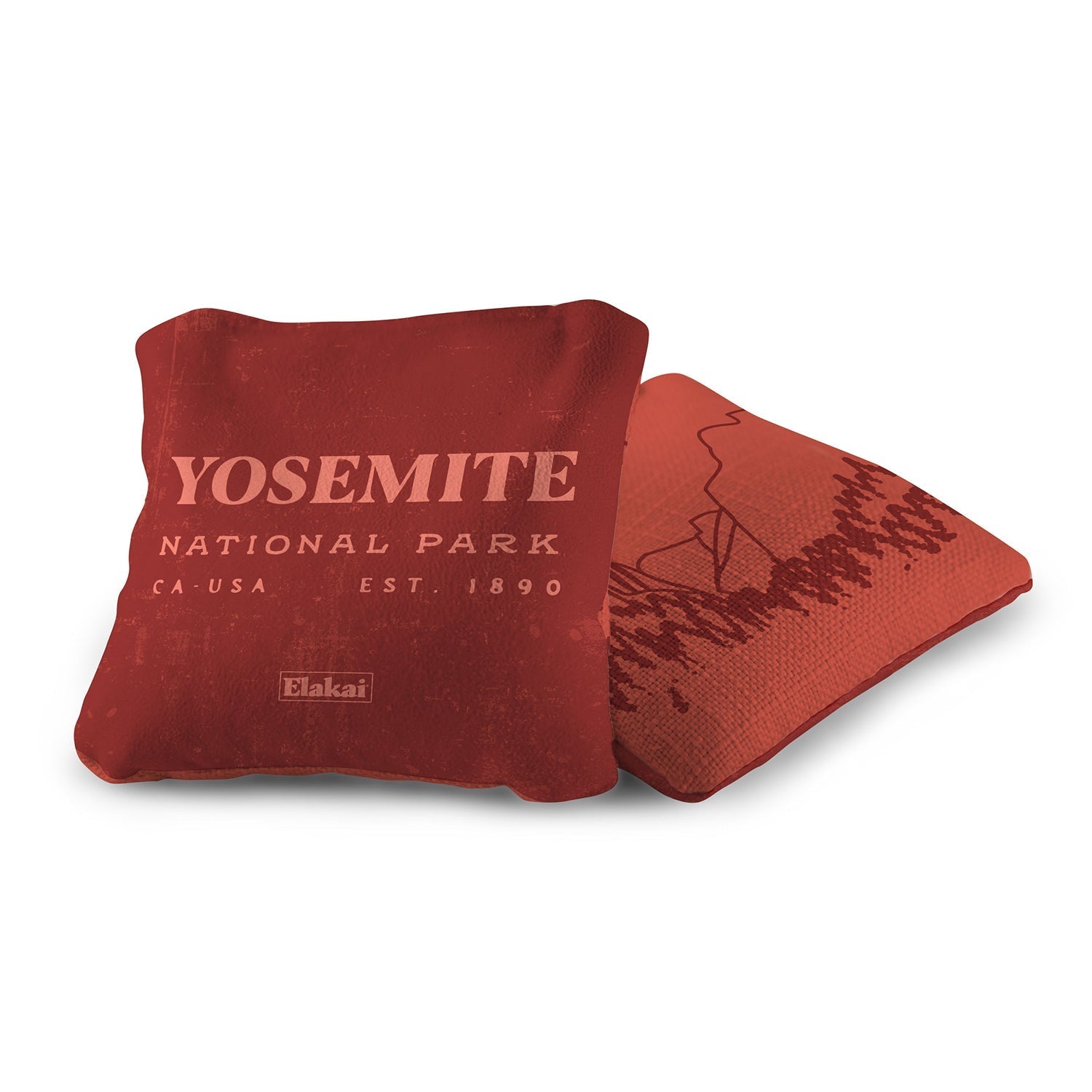 Brown pillow with 'Arches National Park' text on a white background