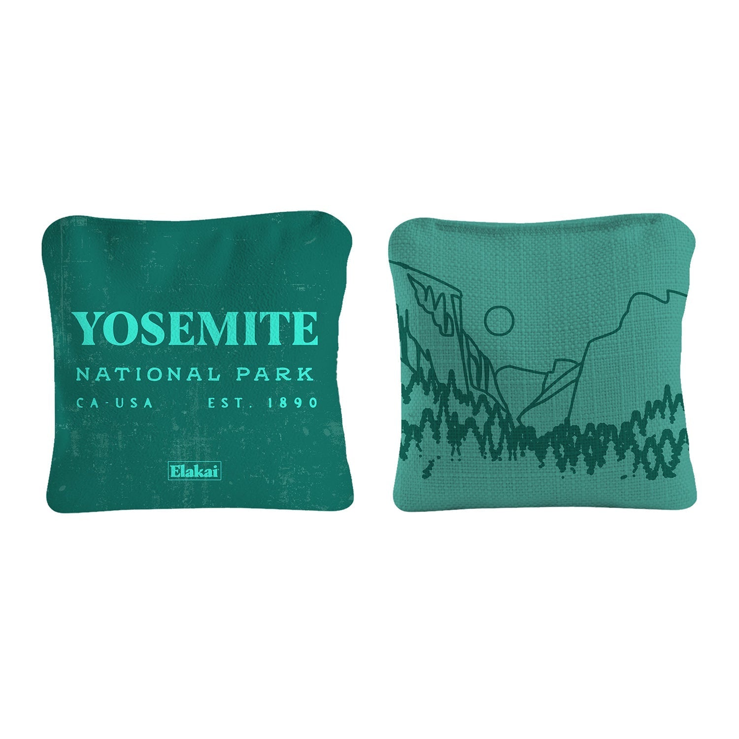 Two green pillows with Yosemite National Park text and design on a white background
