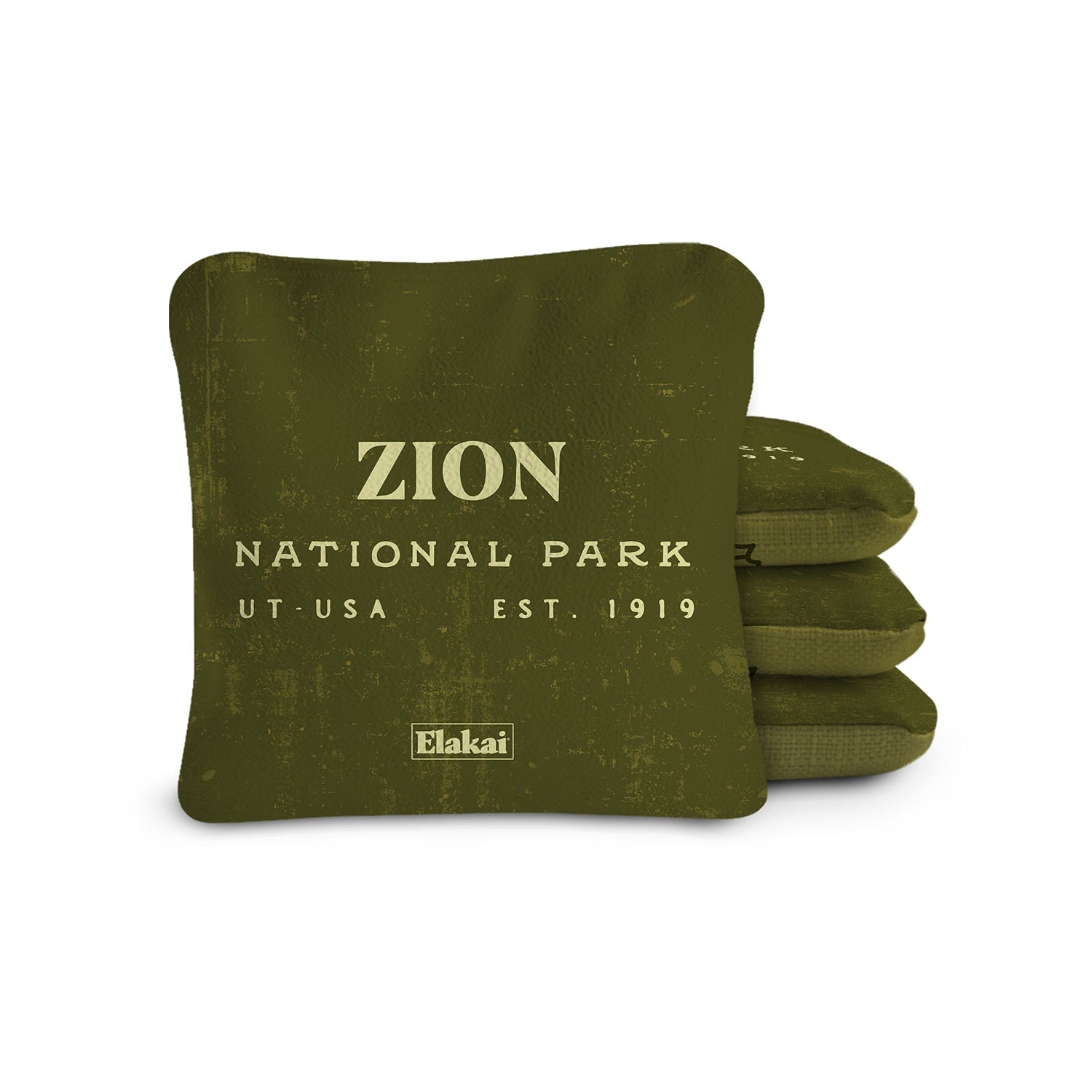 Green pillow with 'Zion National Park' text and Elakai logo on a white background