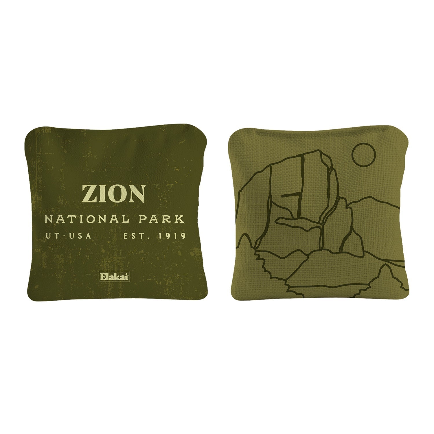 Two square pillows, one with 'Mojave National Preserve' text and the other with a hand design, on a white background.