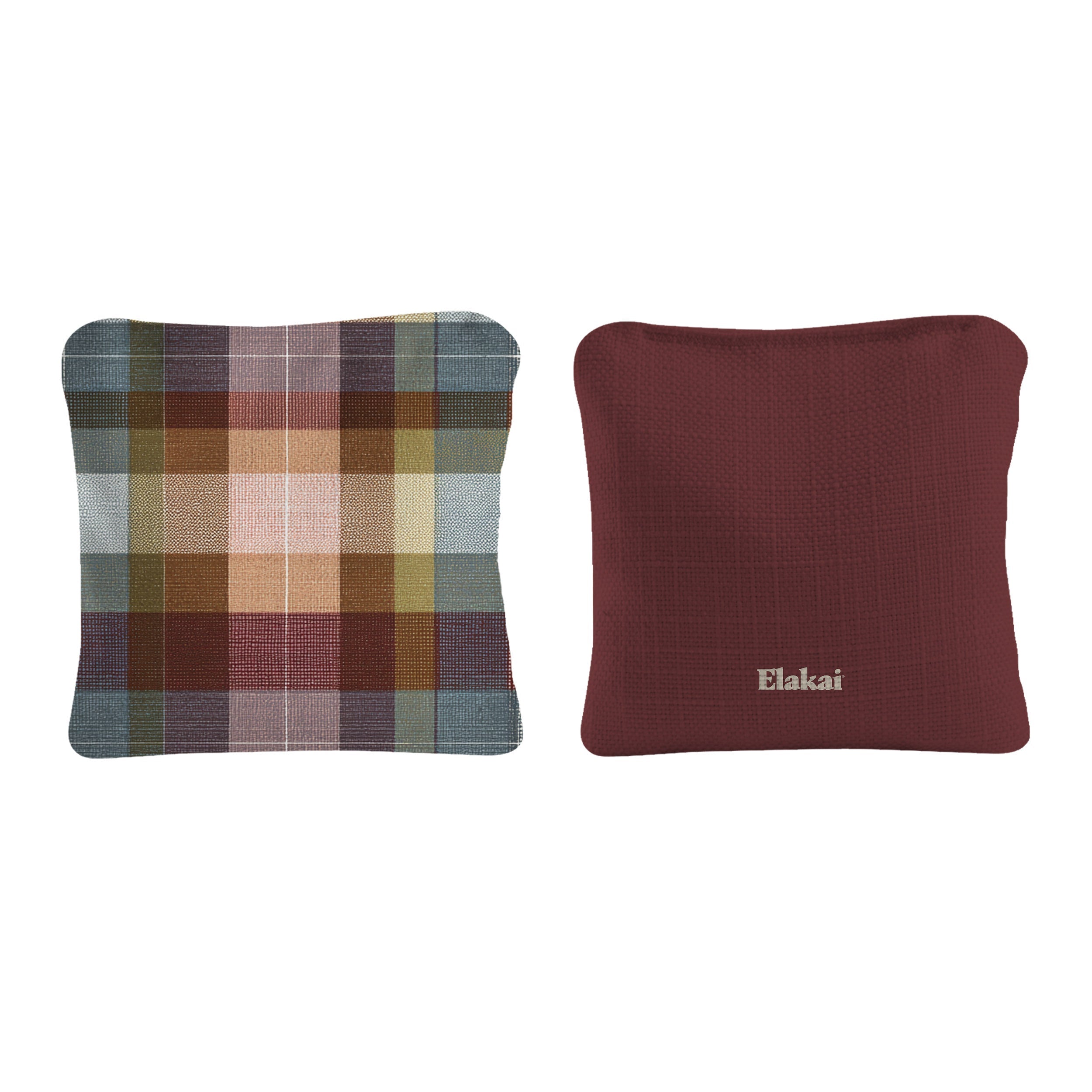 Two pillows, one plaid and one solid maroon, on a white background with 'Elakai' branding.