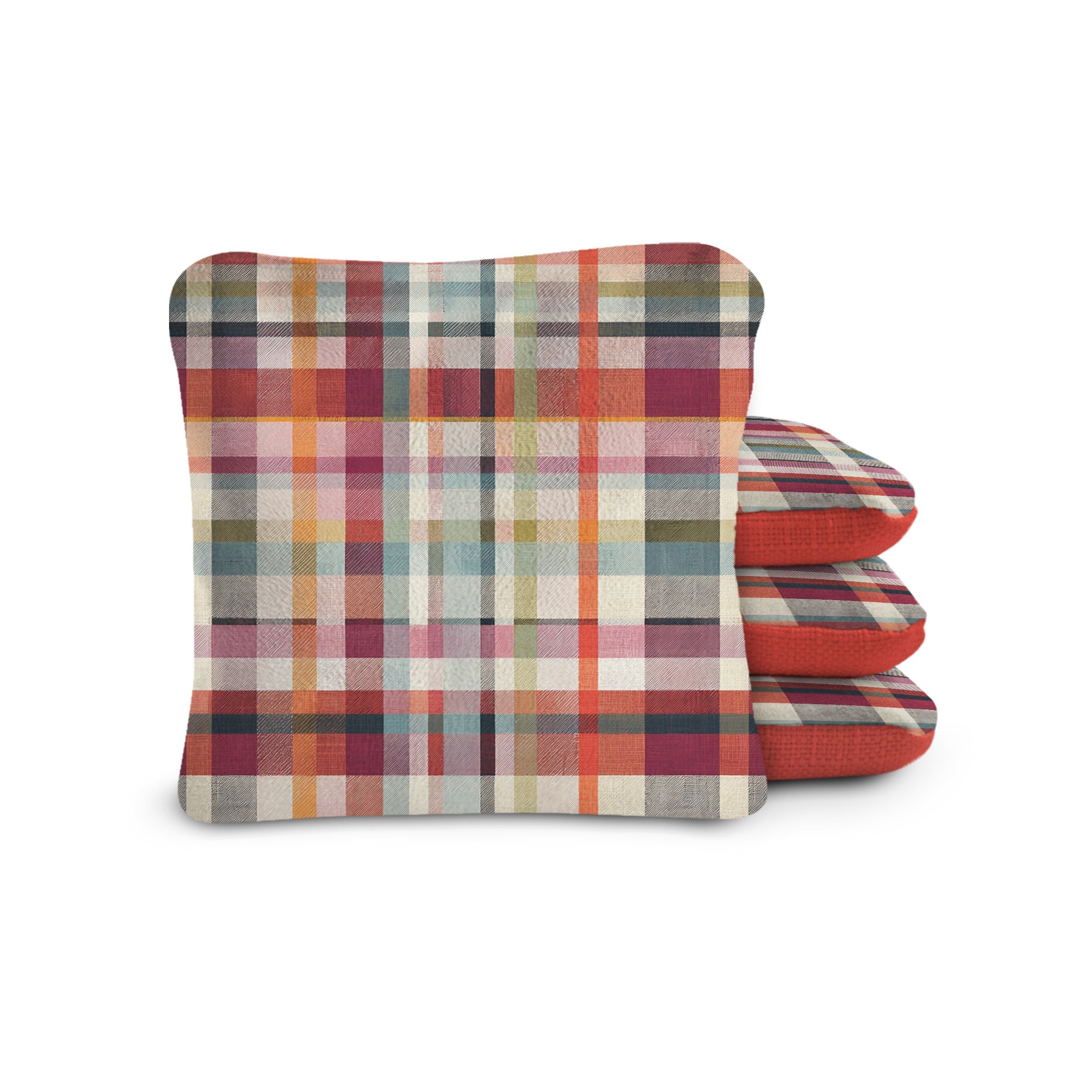 Stack of plaid fabric cushions on a white background