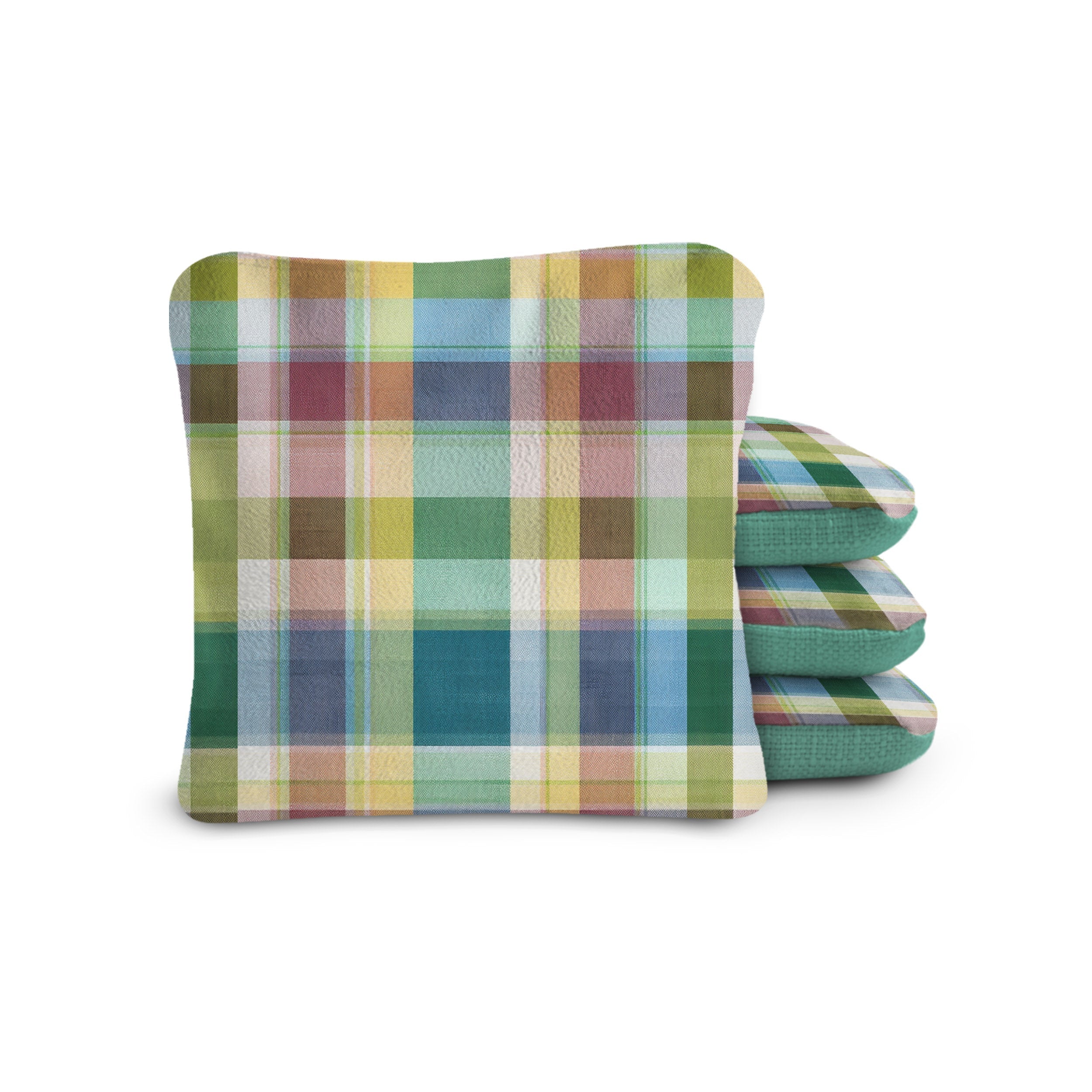 Stack of colorful plaid fabric on a white background