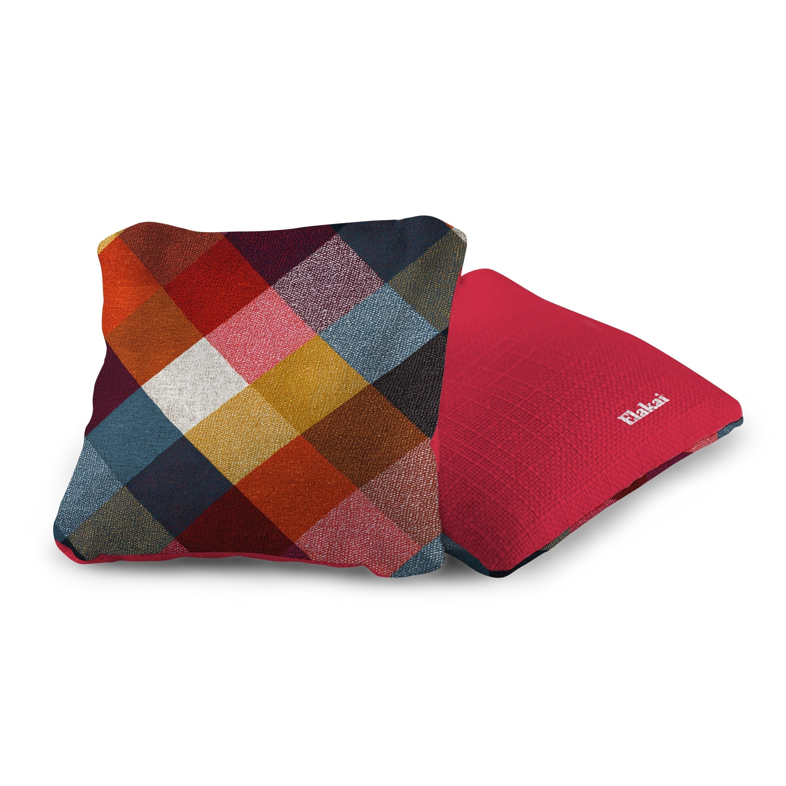 Colorful checkered pillow and red textured pillow on a white background