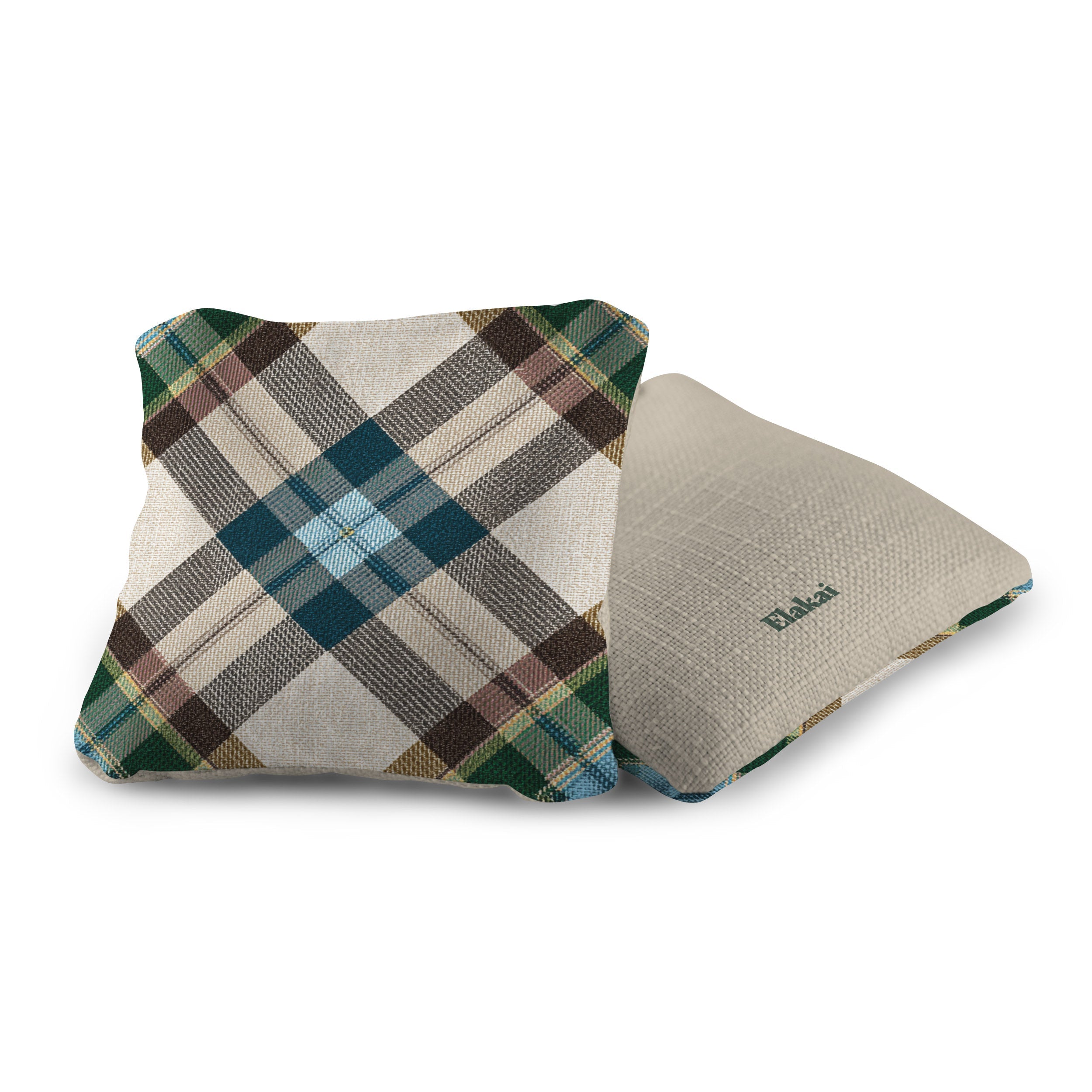 Two fabric cushions, one plaid and one plain, on a white background