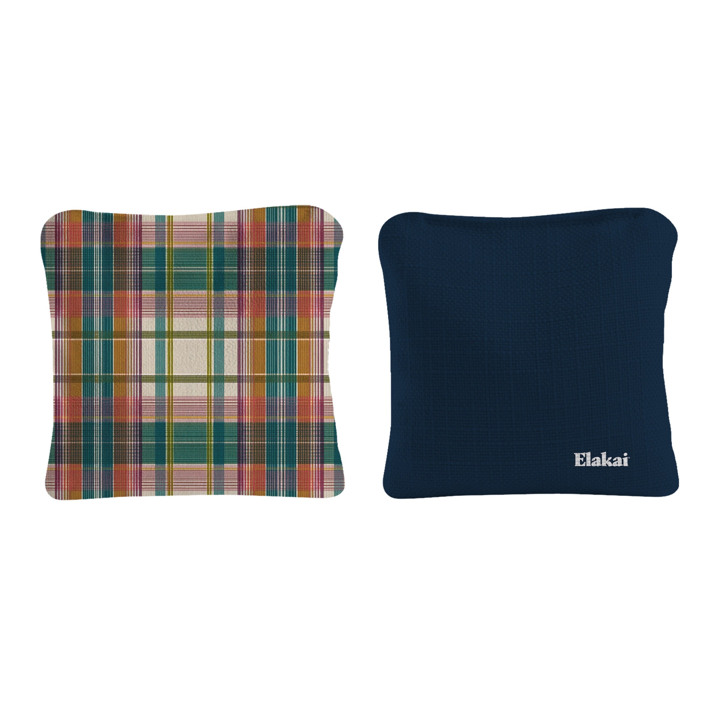 Two pillows, one plaid and one navy with 'Elakai' branding, on a white background.
