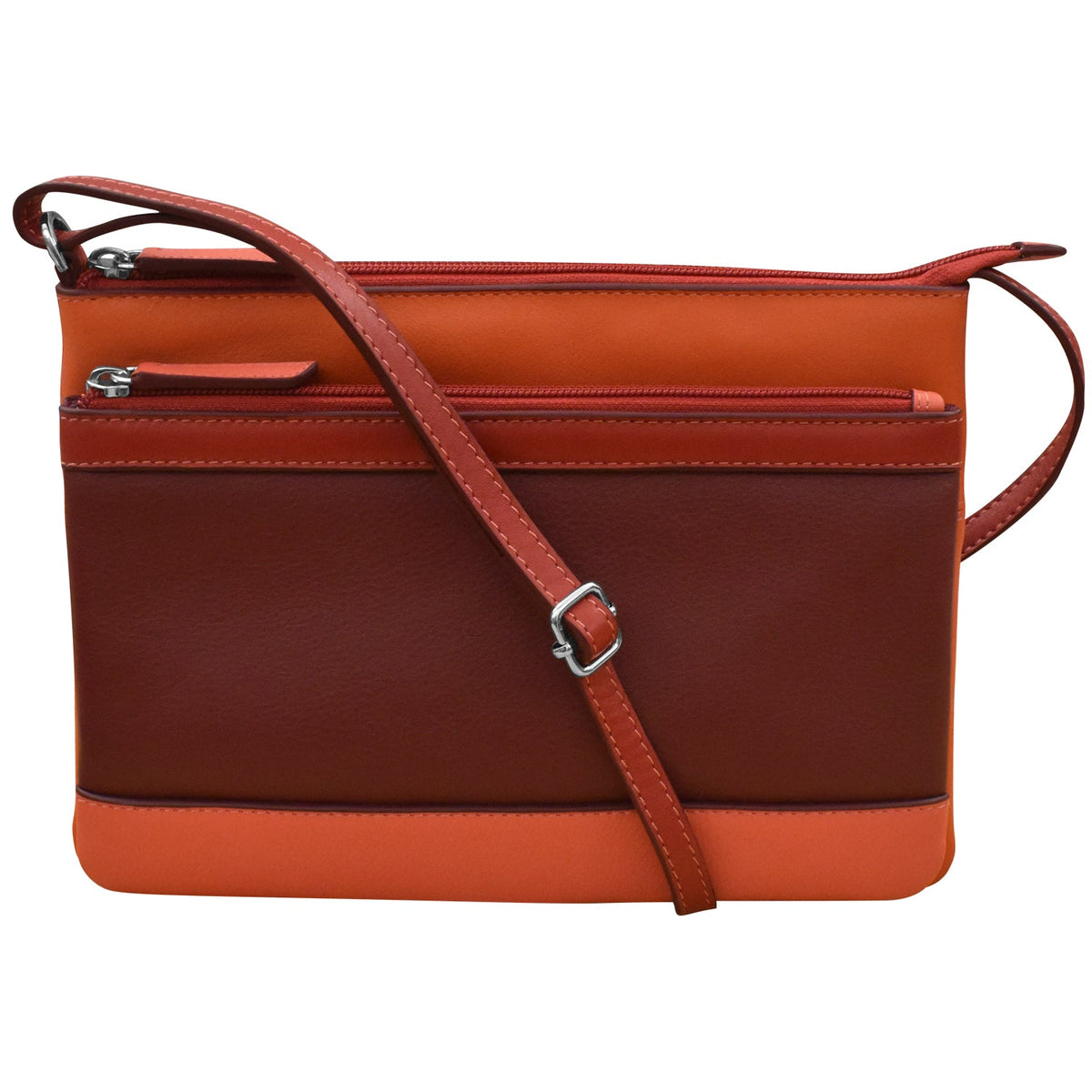 Two-tone brown and orange handbag with a strap on a white background