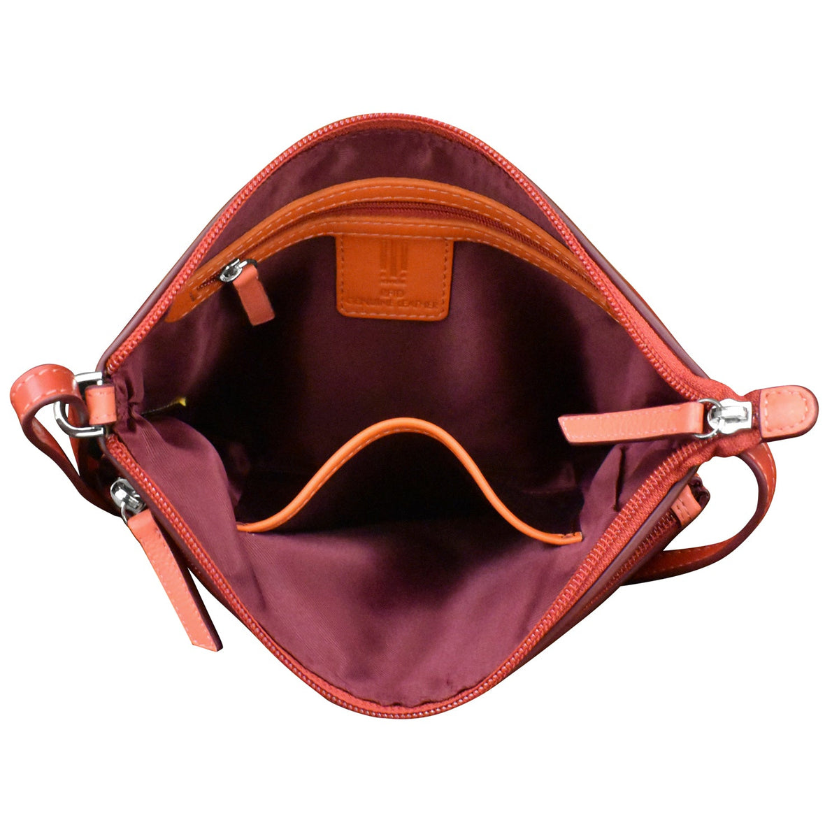 Open red handbag with visible brand logo on a white background