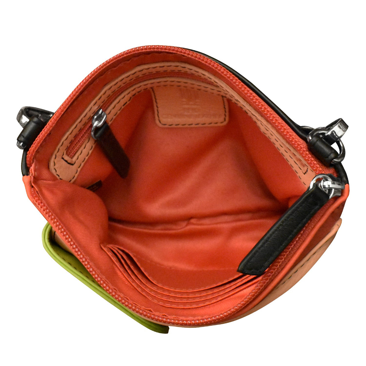 Open orange leather bag with black zippers on a white background