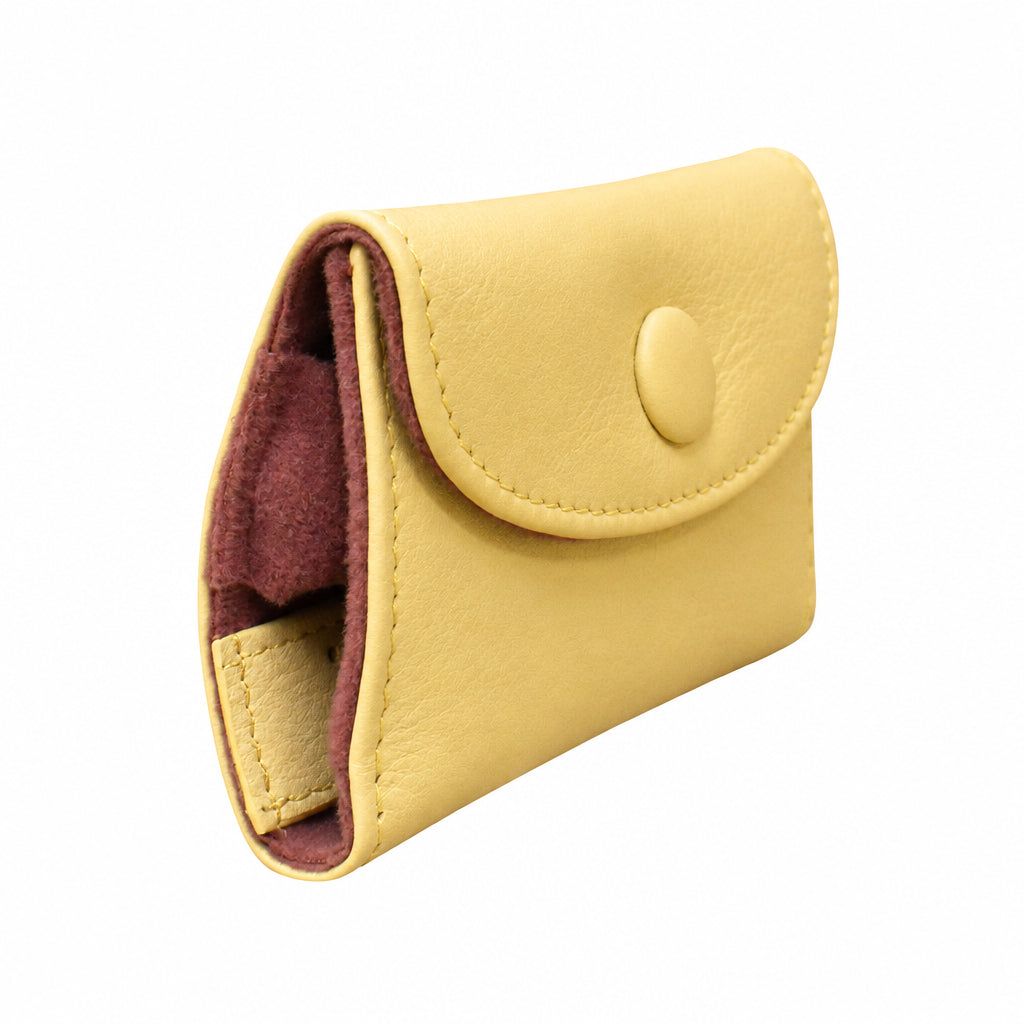 Small cream-colored leather wallet with a button closure on a white background
