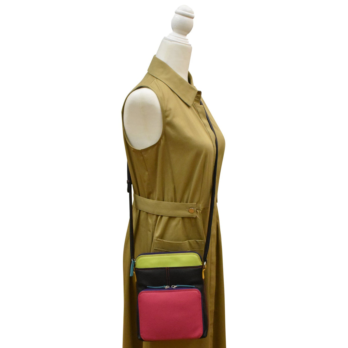 Mannequin wearing a beige dress with a colorful crossbody bag on a white background