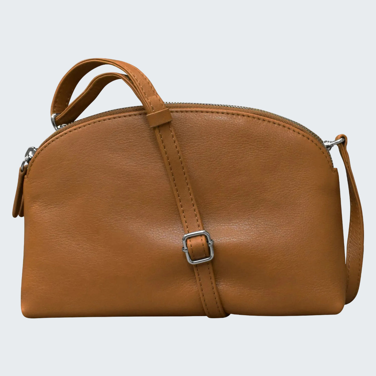 Brown leather handbag with a strap on a white background