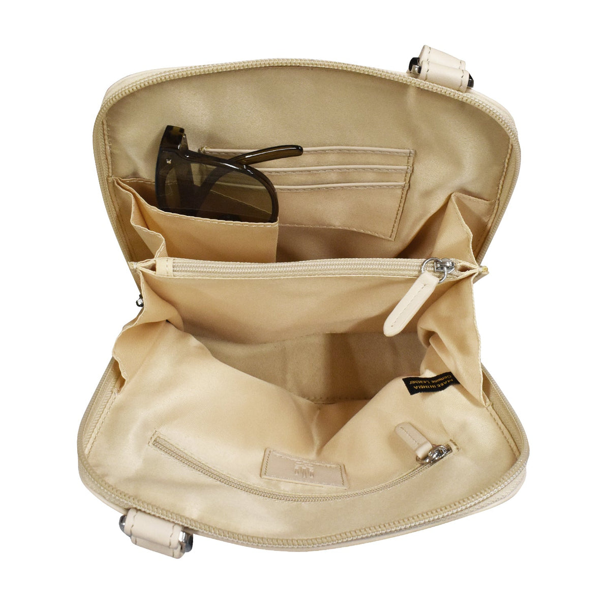Beige toiletry bag with sunglasses inside on a white background