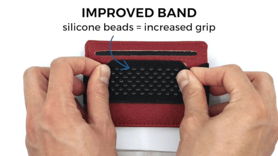 Red and black band with silicone beads being held by hands, text 'IMPROVED BAND silicone beads = increased grip' above.