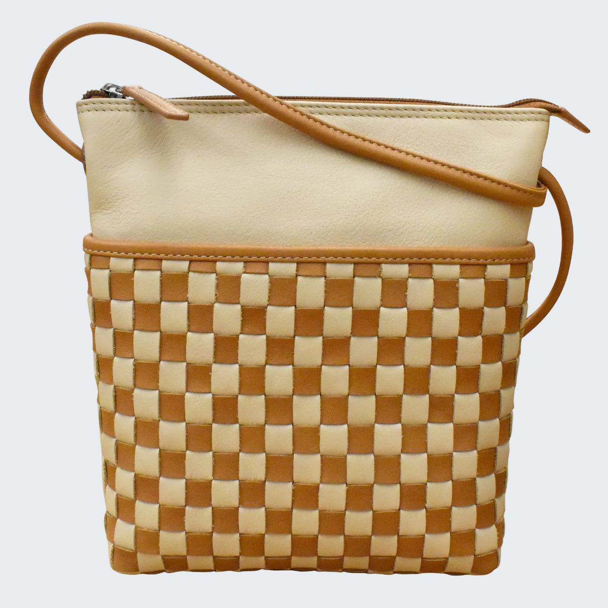 Beige and brown checkered handbag with a strap on a white background