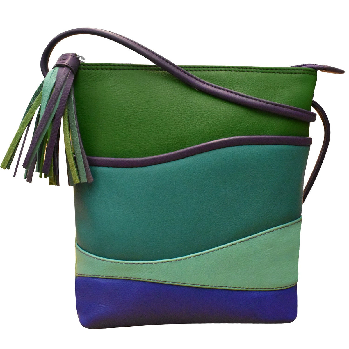 Green and blue handbag with tassel on a white background