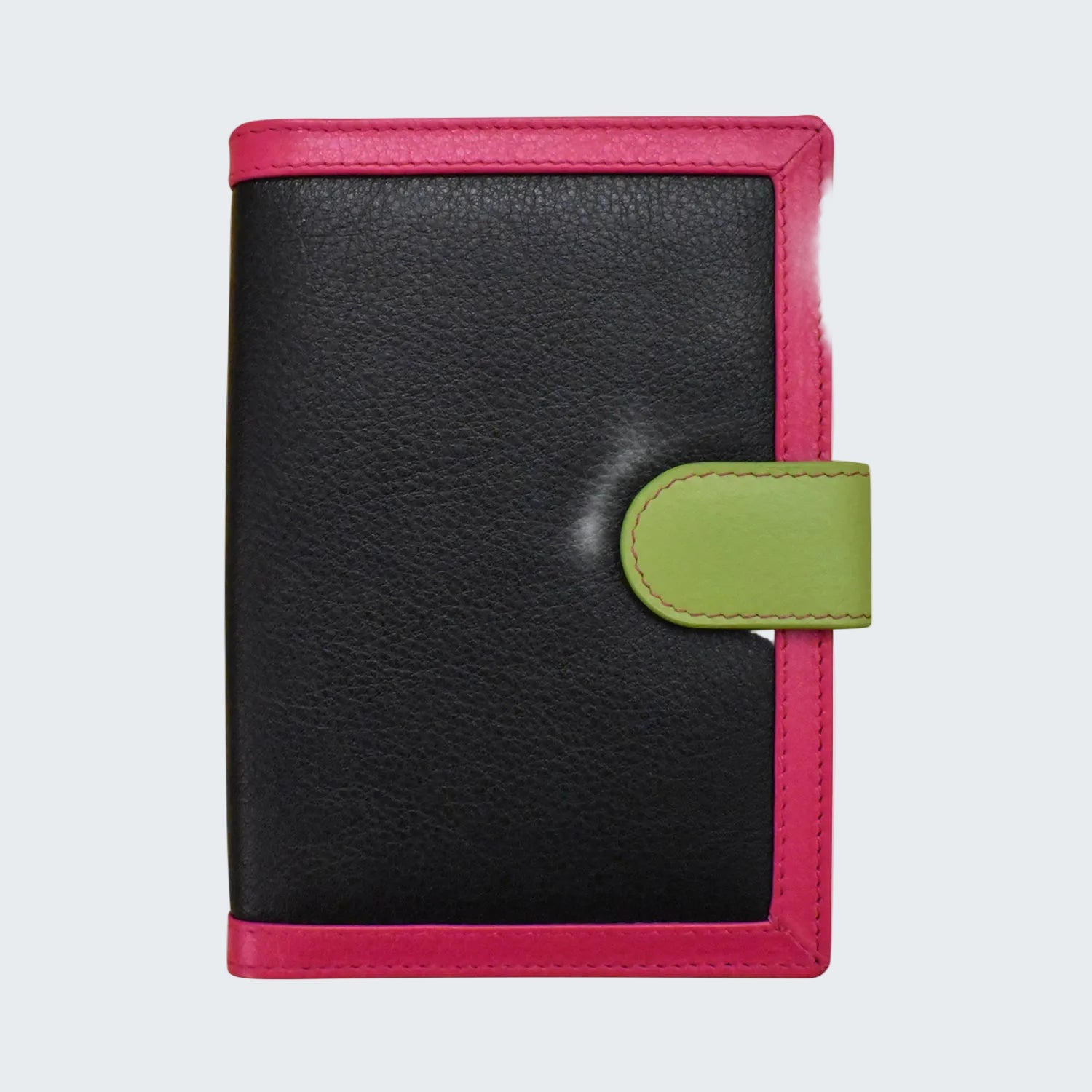 A small leather wallet or notebook cover with a black pebbled center, bright pink border, and an olive green snap tab closure, shown on a plain white background.