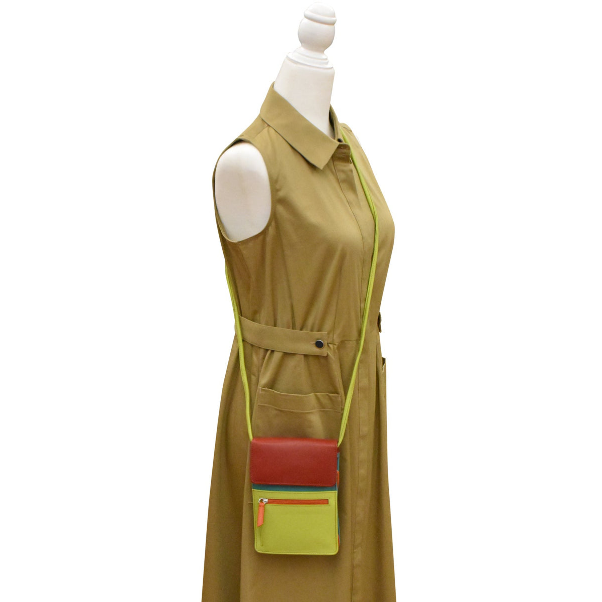 Brown dress with a colorful pocket on a mannequin against a white background