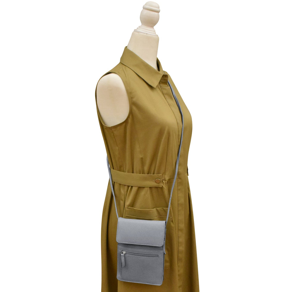 Mannequin wearing a mustard yellow dress with a gray pocket on a white background