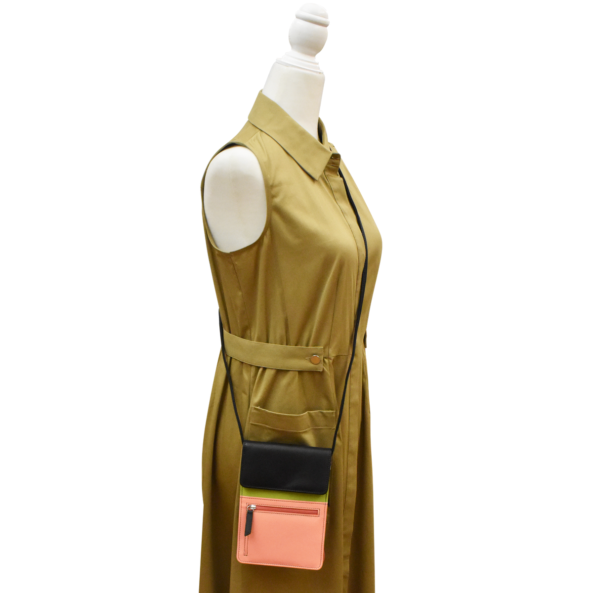 Green sleeveless dress with a belt and pink pocket on a mannequin against a white background