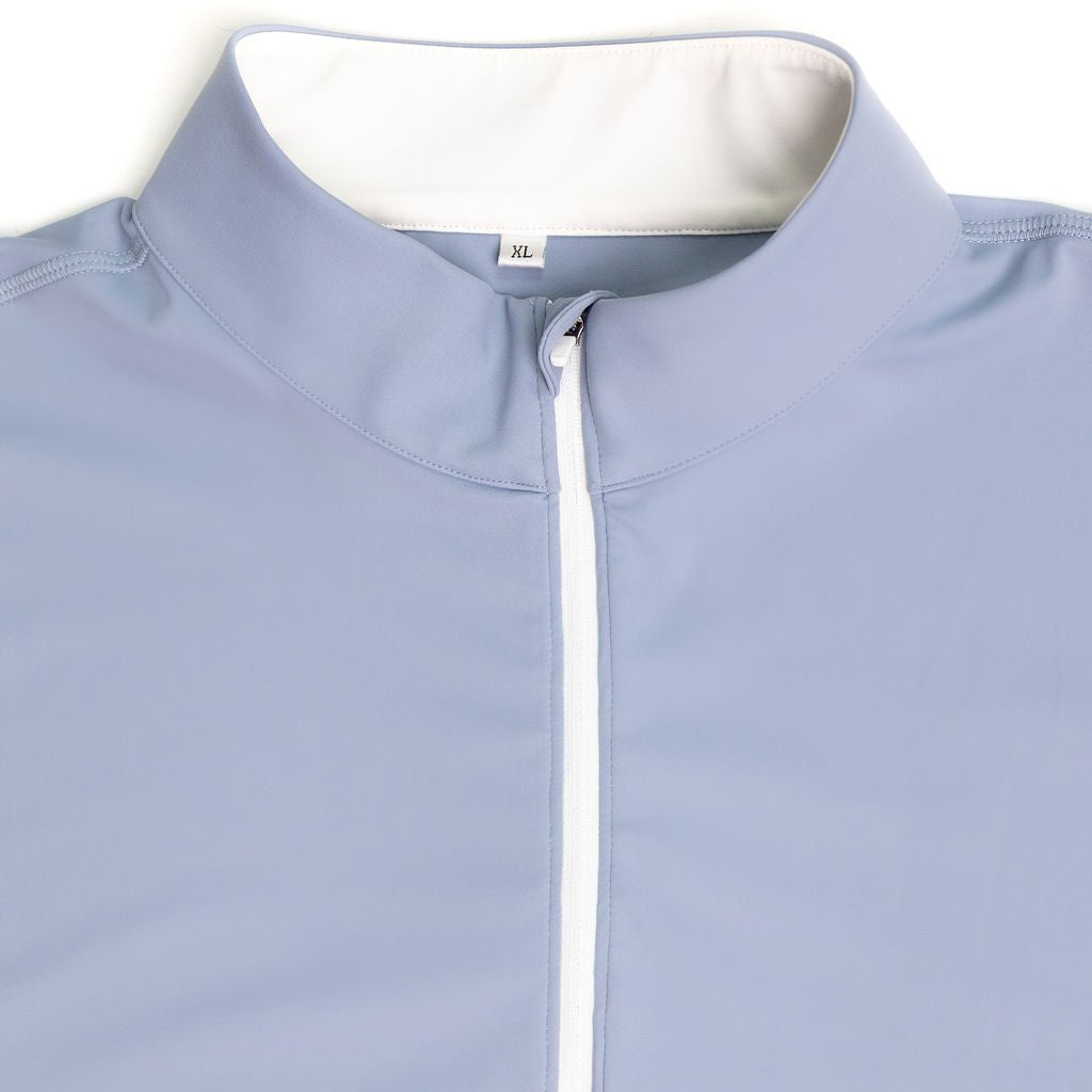 Light blue pullover with a white zipper on a white background
