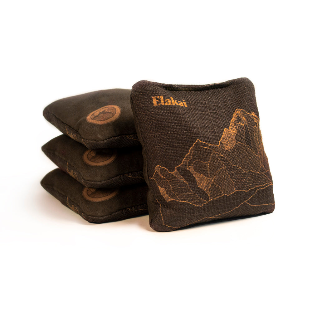 Three brown bean bags with 'Elakai' branding on a white background