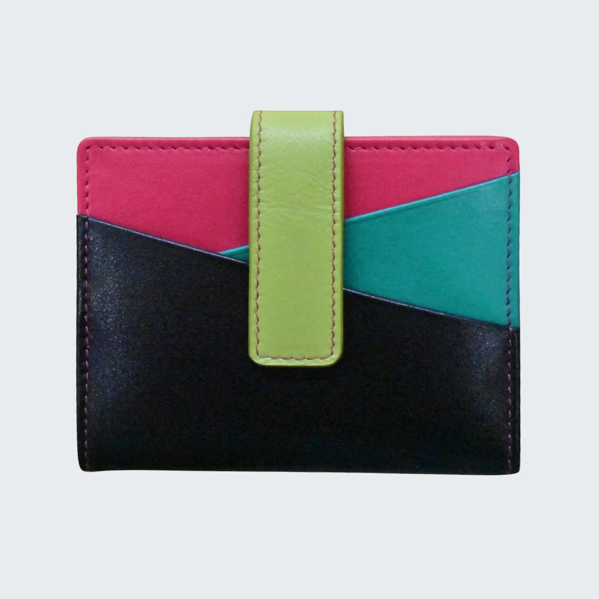 A color-blocked leather card holder wallet with a vertical strap closure. The wallet features three main color sections: a black lower half, a bright pink upper-left section, and a teal upper-right section, accented by a lime green leather strap in the center.