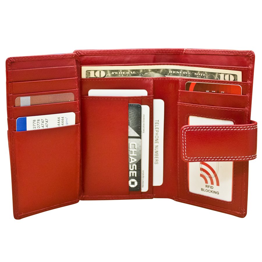 Red leather wallet with various cards and money on a white background