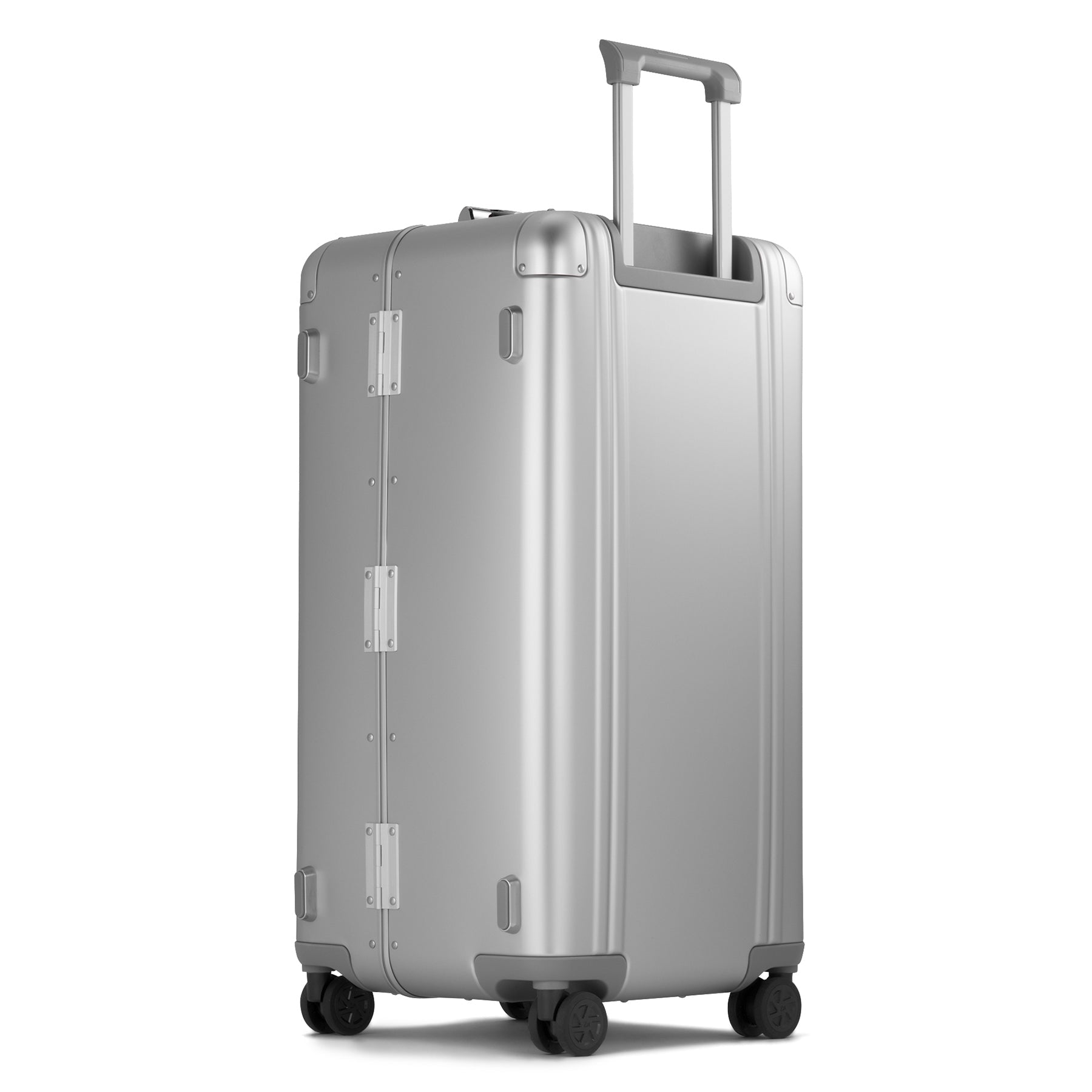 Silver suitcase with wheels on a white background