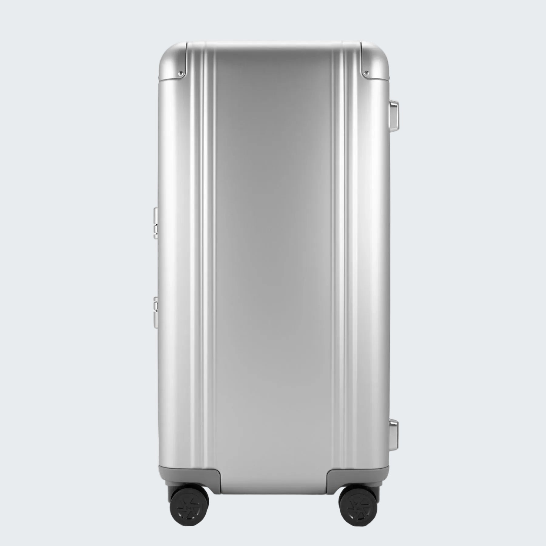 Silver suitcase with wheels on a white background