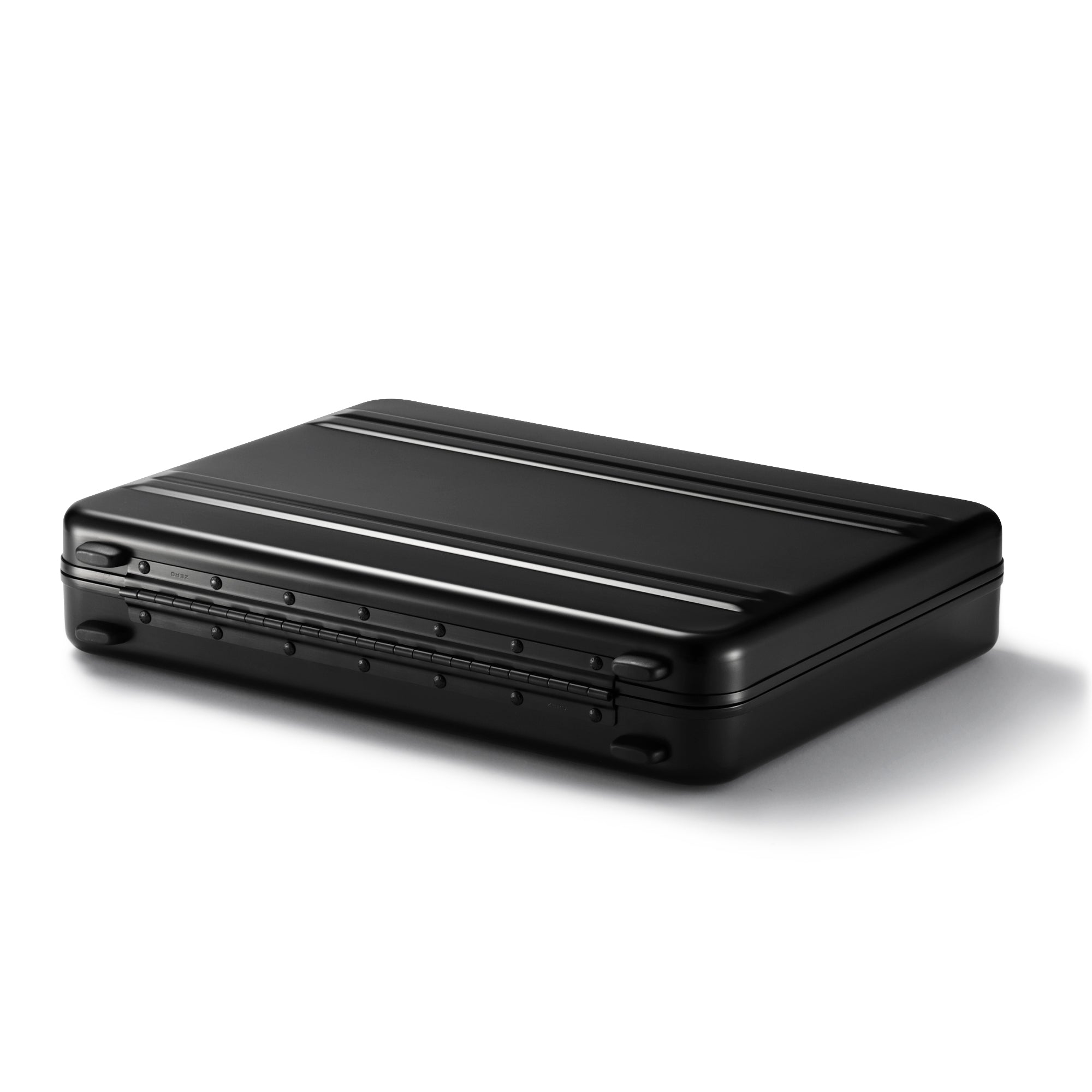 Black rectangular electronic device on a white background