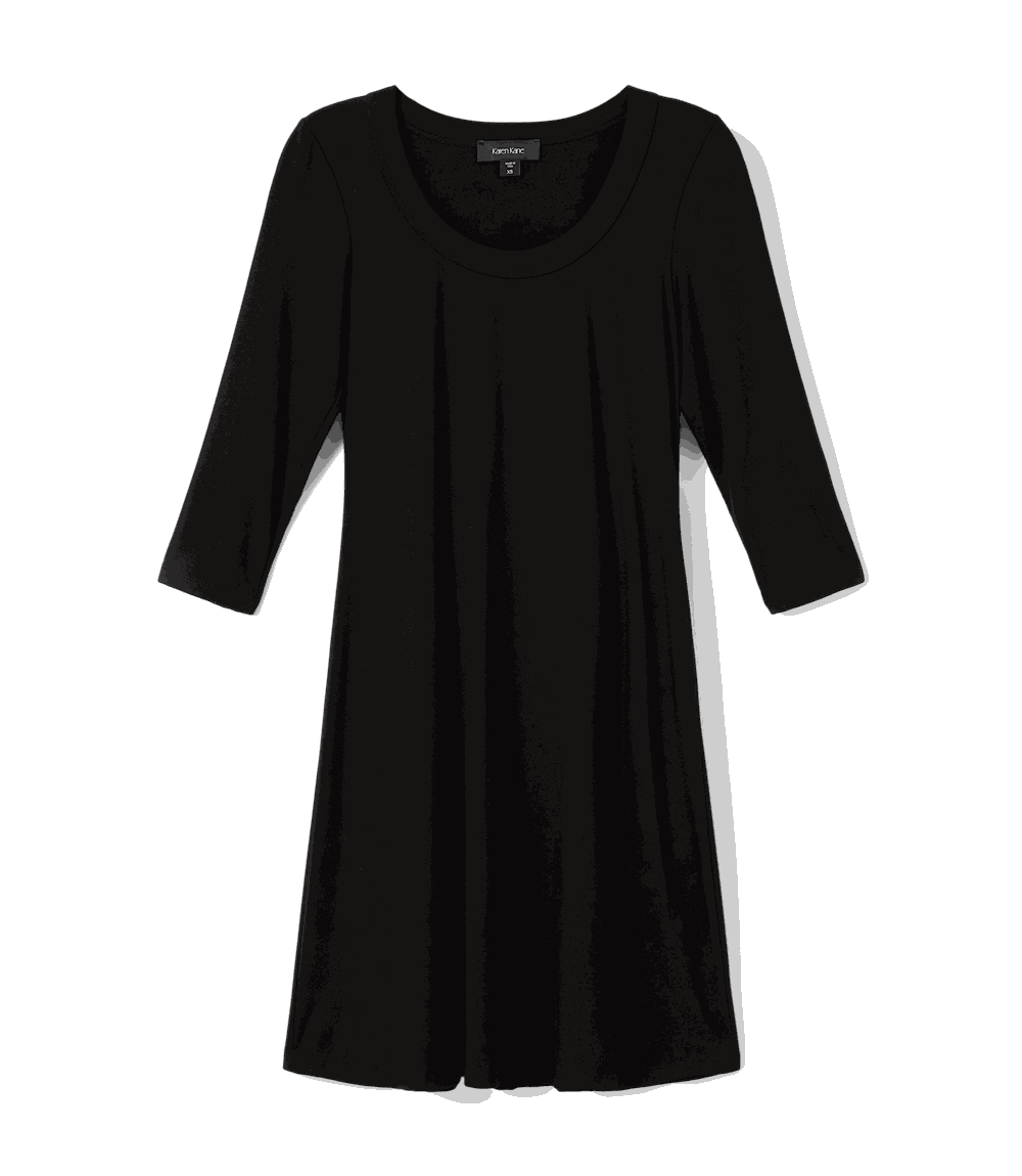 A black three-quarter sleeve tunic dress with a wide round neckline, shown against a solid black background.