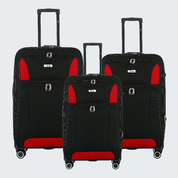 Set of black suitcases with red accents on a white background