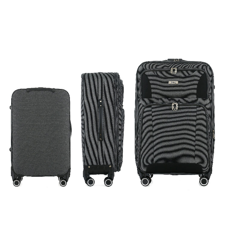 Three black suitcases of different sizes on a white background
