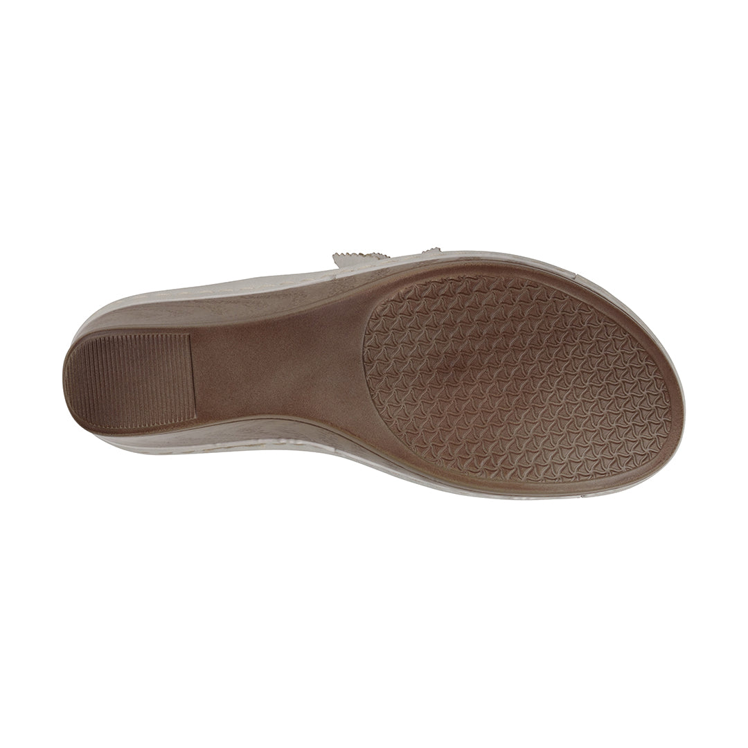 Brown sole of a shoe on a white background