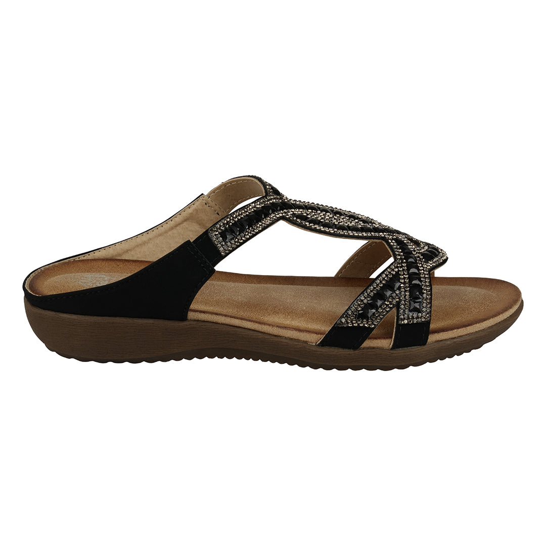 Black sandal with brown sole on a white background